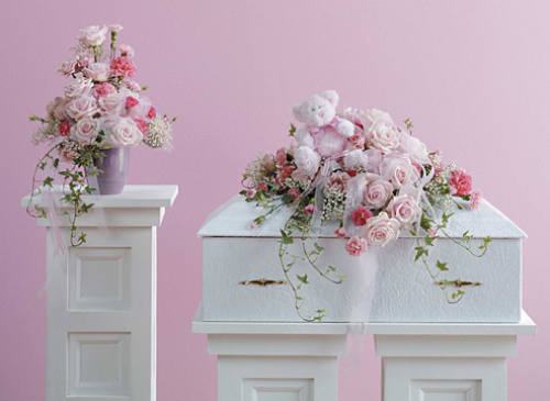 Pink Infant Casket Spray with Plush Animal